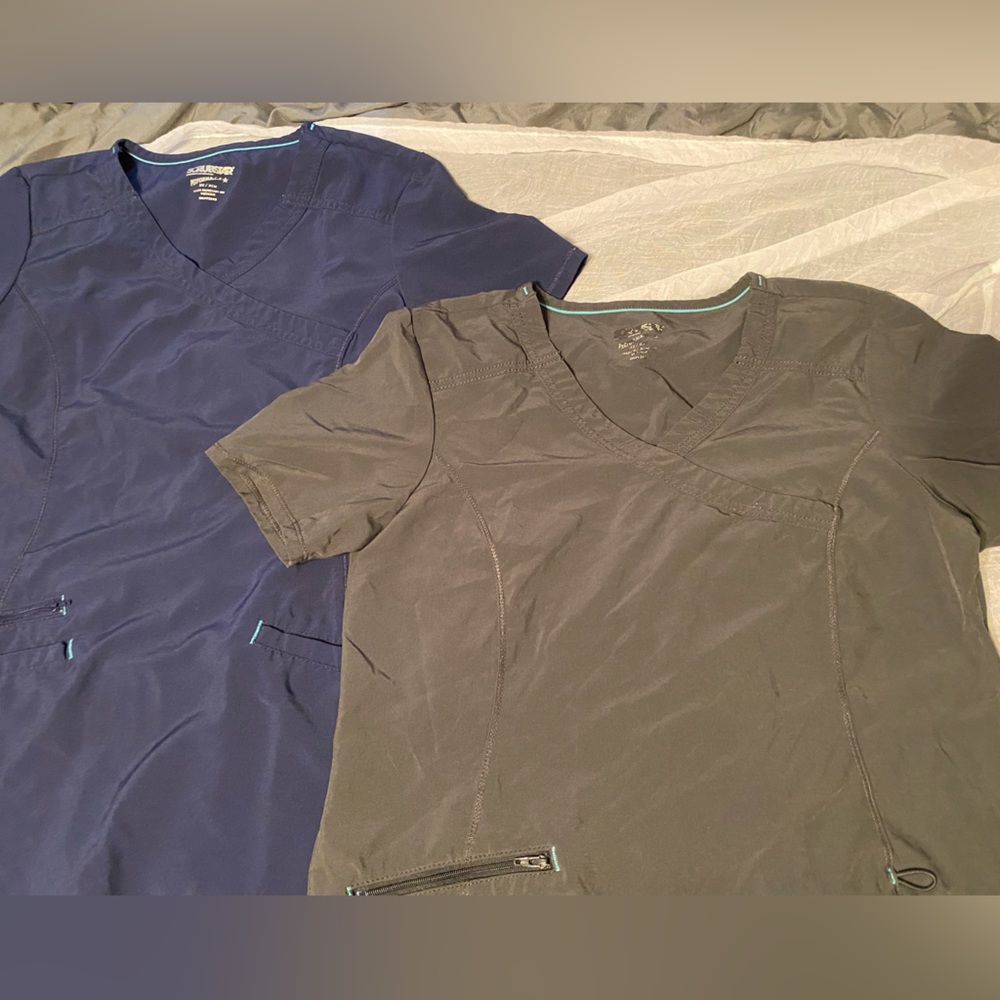 Two loose fitting scrub tops